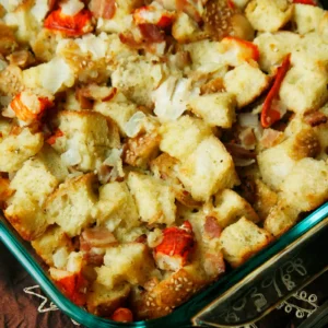 Thanksgiving holiday stuffing with bread, lobster, and bacon.