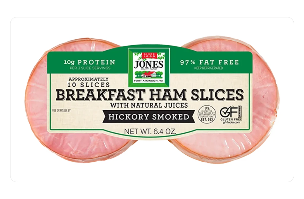 Jones Dairy Farm Hickory Smoked Breakfast Ham Slices, 6.4 oz. package showing two rounds of sliced ham with natural juices