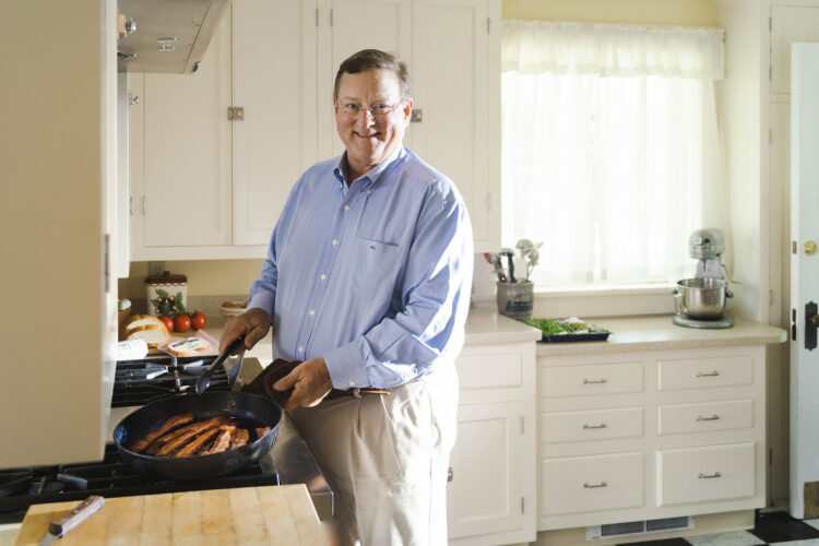 Phillip Jones cooking at home