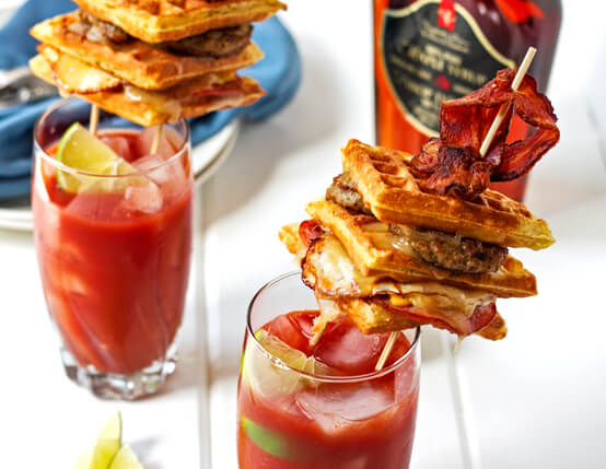 Two glasses of Bloody Mary with bacon rashers Stock Photo by Alex9500