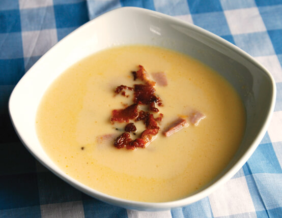 Beer and cheese soup with smocked ham