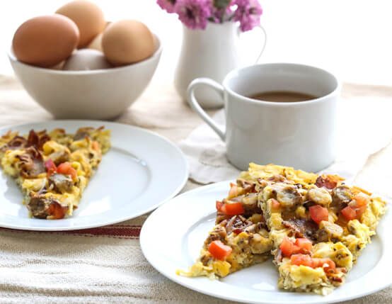 Breakfast pizza with hash brown crust