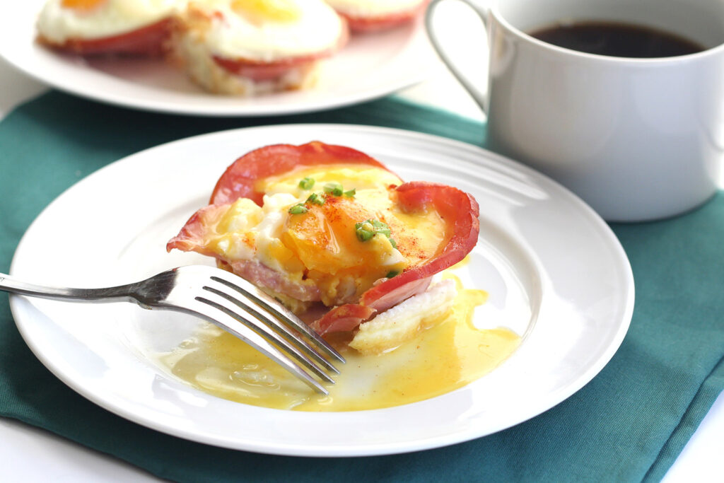 Eggs Benedict in Canadian bacon breakfast cups