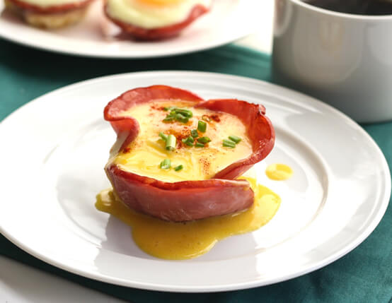 Eggs Benedict in Canadian bacon breakfast cups