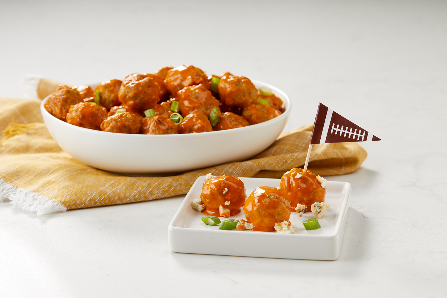 Buffalo Chicken Meatballs with Football Flag for Appetizers, gameday meatballs, party appetizers, easy chicken meatballs