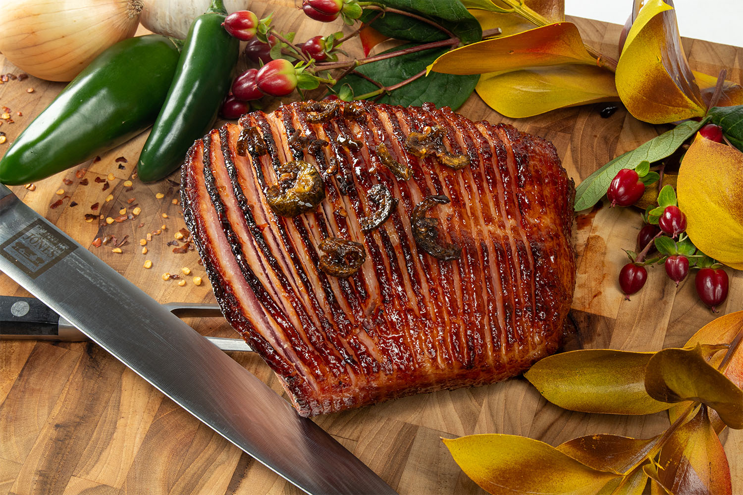 Hasselback Heritage Ham with Sweet Pineapple Chili Crisp Glaze. Sweet and Savory Ham Glaze, The Perfect Sweet and Savory Glaze for Your Holiday Table