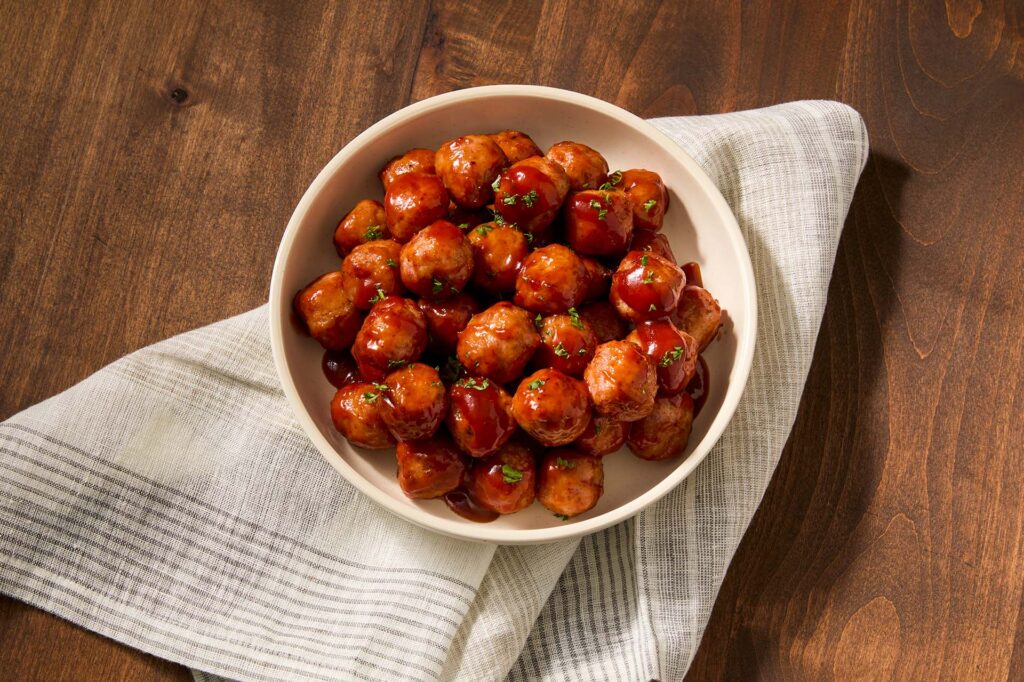 Introducing Jones Dairy Farm Fully Cooked Pork and Bacon Meatballs for Foodservice, Bacon Meatballs, Foodservice Bacon Meatballs