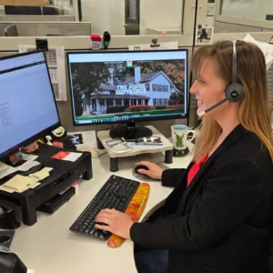 Jones Customer Service Rep taking a call at desk