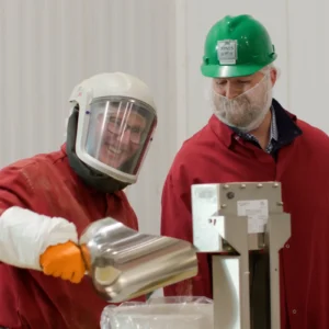 Jones Dairy Farm employees hand blending and weighing spices in the production facility