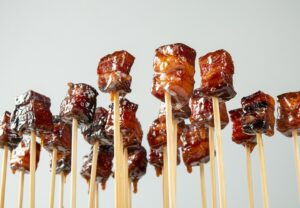 Jones Dairy Farm glazed slab bacon bites on bamboo skewers