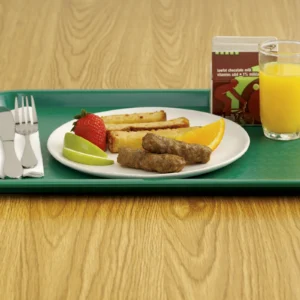 Jones sausage links served with French toast sticks, fresh fruit, orange juice, and chocolate milk on a K-12 school cafeteria tray